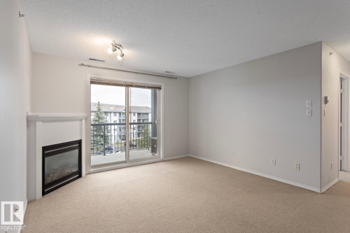 446 16311 95 Street, Edmonton, AB - Indoor With Fireplace