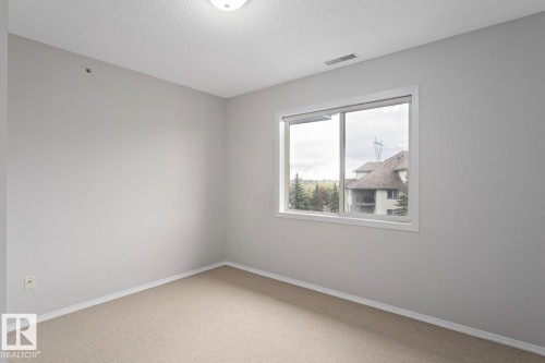 446 16311 95 Street, Edmonton, AB - Indoor Photo Showing Other Room