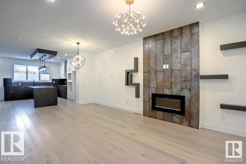 13907 107A Avenue, Edmonton, AB - Indoor Photo Showing Living Room With Fireplace