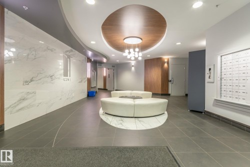 Reception area featuring recessed lighting and a chandelier - 904 10136 104 Street Nw, Edmonton, AB - Indoor Photo Showing Other Room