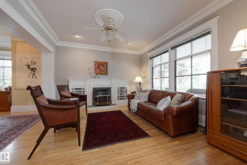 10828 125 Street, Edmonton, AB - Indoor Photo Showing Living Room With Fireplace