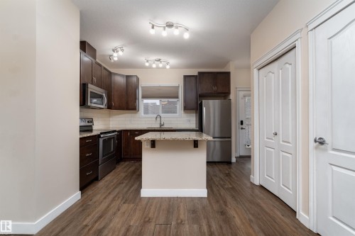 2687 Sir Arthur Currie Way, Edmonton, AB - Indoor Photo Showing Kitchen With Stainless Steel Kitchen