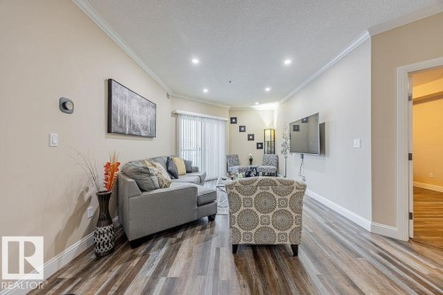 106 14608 125 Street, Edmonton, AB - Indoor Photo Showing Living Room