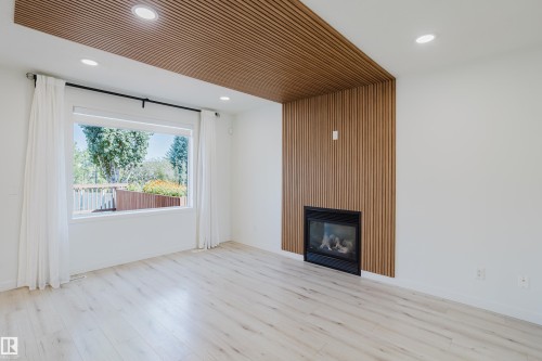1665 Glastonbury Boulevard, Edmonton, AB - Indoor Photo Showing Other Room With Fireplace
