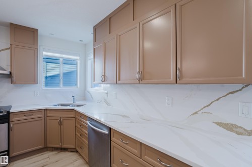 1665 Glastonbury Boulevard, Edmonton, AB - Indoor Photo Showing Kitchen With Double Sink