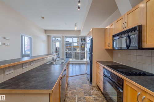 143 10403 122 Street, Edmonton, AB - Indoor Photo Showing Kitchen With Double Sink