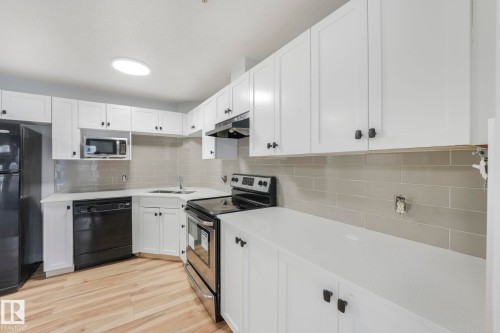326 111 Edwards Drive, Edmonton, AB - Indoor Photo Showing Kitchen With Double Sink With Upgraded Kitchen