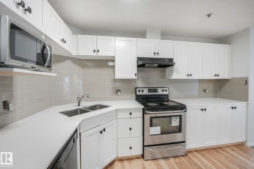 326 111 Edwards Drive, Edmonton, AB - Indoor Photo Showing Kitchen With Double Sink With Upgraded Kitchen