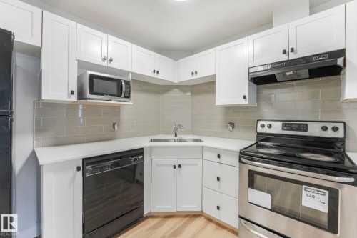 326 111 Edwards Drive, Edmonton, AB - Indoor Photo Showing Kitchen With Double Sink