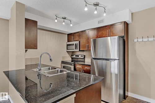 413 11820 22 Avenue, Edmonton, AB - Indoor Photo Showing Kitchen With Double Sink With Upgraded Kitchen