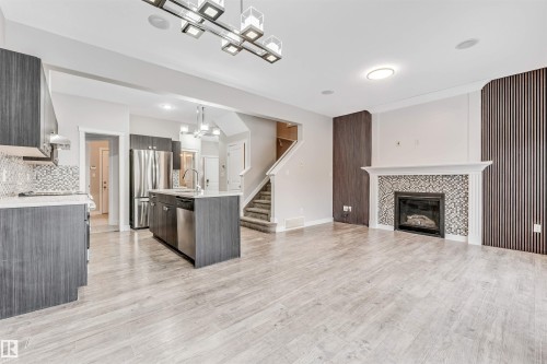 2812 15 Street, Edmonton, AB - Indoor Photo Showing Kitchen With Fireplace