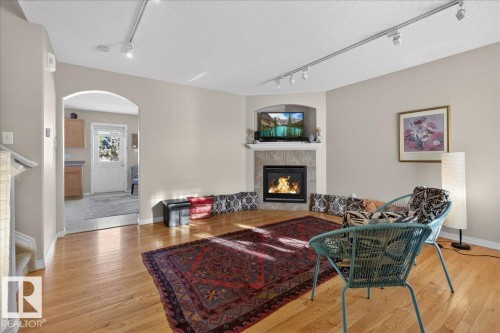 1921 Garnett Way, Edmonton, AB - Indoor Photo Showing Living Room With Fireplace