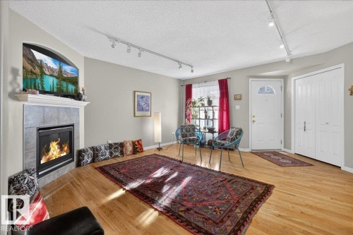 1921 Garnett Way, Edmonton, AB - Indoor Photo Showing Living Room With Fireplace