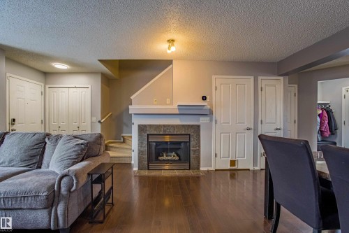 7312 19A Avenue, Edmonton, AB - Indoor Photo Showing Living Room With Fireplace