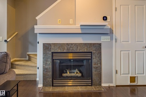 7312 19A Avenue, Edmonton, AB - Indoor Photo Showing Living Room With Fireplace