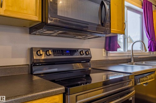 7312 19A Avenue, Edmonton, AB - Indoor Photo Showing Kitchen With Stainless Steel Kitchen With Double Sink