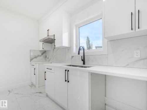 715 165 Avenue, Edmonton, AB - Indoor Photo Showing Kitchen With Double Sink