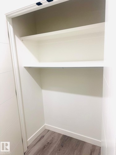 View of closet - 3906 41 Avenue, Beaumont, AB - Indoor With Storage