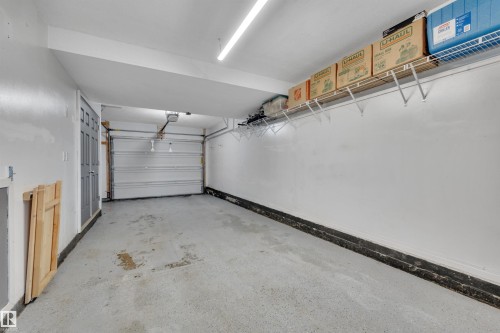 142 3305 Orchards Link Link, Edmonton, AB - Indoor Photo Showing Garage