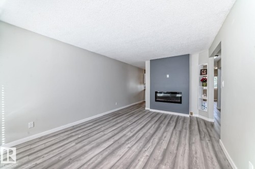 10936 Beaumaris Road, Edmonton, AB - Indoor With Fireplace