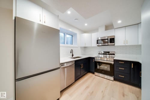10649 81 Street, Edmonton, AB - Indoor Photo Showing Kitchen With Double Sink With Upgraded Kitchen