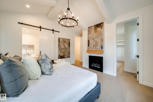 6003 111 Avenue, Edmonton, AB - Indoor Photo Showing Bedroom With Fireplace