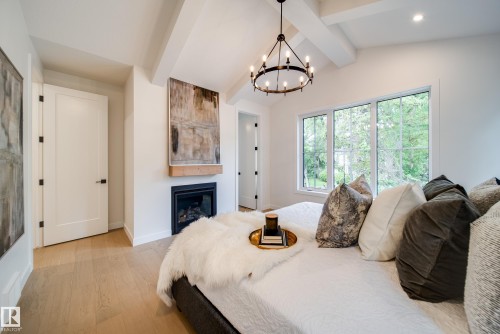 6003 111 Avenue, Edmonton, AB - Indoor Photo Showing Bedroom With Fireplace