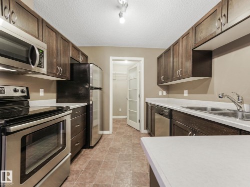 7330 7327 South Terwillegar Drive, Edmonton, AB - Indoor Photo Showing Kitchen With Stainless Steel Kitchen With Double Sink