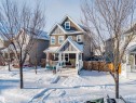 Rare 2-storey in Summerside, Edmonton’s Lake Community, featuring a spacious loft on a third level that adds incredible versatility for many lifestyles. Exterior charm includes a front verandah with a Victorian architectural feel. - 1312 74 Street, Edmonton, AB  - Outdoor 
