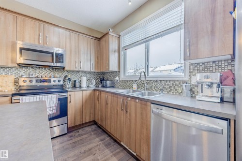 1312 74 Street, Edmonton, AB - Indoor Photo Showing Kitchen With Double Sink