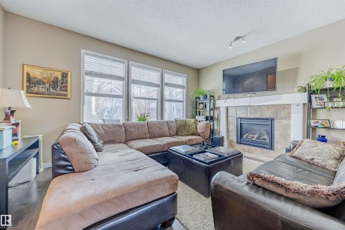 1312 74 Street, Edmonton, AB - Indoor Photo Showing Living Room With Fireplace