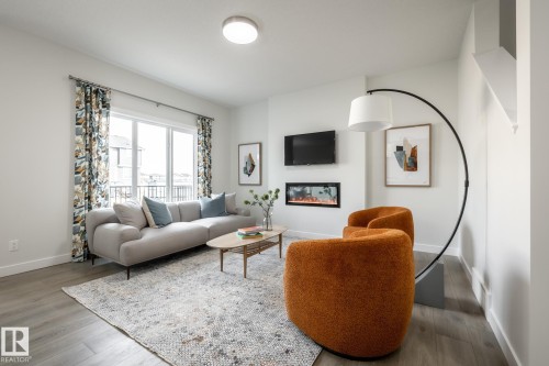 11 Gable Common, Spruce Grove, AB - Indoor Photo Showing Living Room With Fireplace