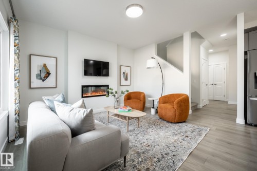 11 Gable Common, Spruce Grove, AB - Indoor Photo Showing Living Room With Fireplace