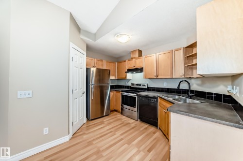 48 150 Edwards Drive, Edmonton, AB - Indoor Photo Showing Kitchen With Double Sink
