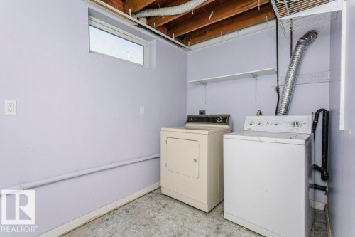5214 49 Street, Leduc, AB - Indoor Photo Showing Laundry Room