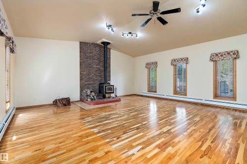 240028 Twp 460, Rural Wetaskiwin County, AB - Indoor With Fireplace