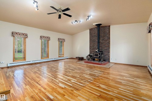 240028 Twp 460, Rural Wetaskiwin County, AB - Indoor With Fireplace