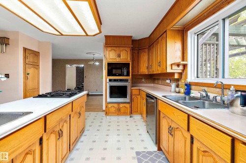 240028 Twp 460, Rural Wetaskiwin County, AB - Indoor Photo Showing Kitchen With Double Sink