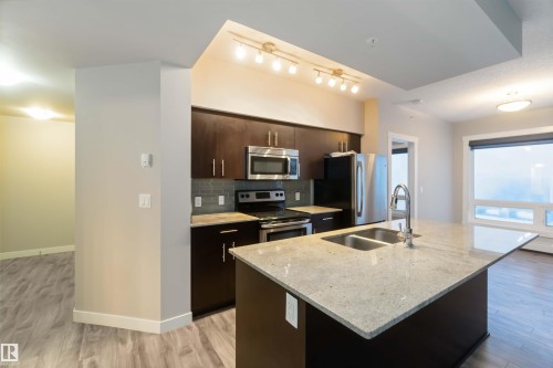 602 10226 104 Street, Edmonton, AB - Indoor Photo Showing Kitchen With Stainless Steel Kitchen With Double Sink With Upgraded Kitchen