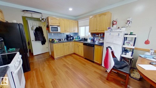 4710 56 Avenue, Bruderheim, AB - Indoor Photo Showing Kitchen With Double Sink