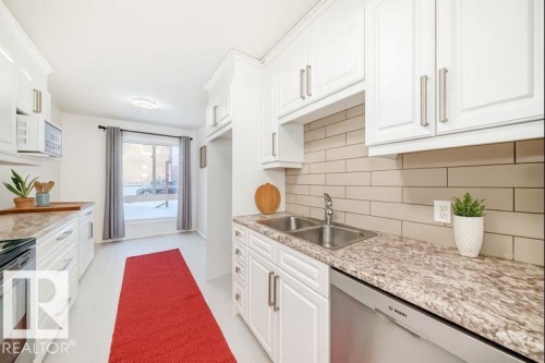 2 Grandin Village, St. Albert, AB - Indoor Photo Showing Kitchen With Double Sink With Upgraded Kitchen