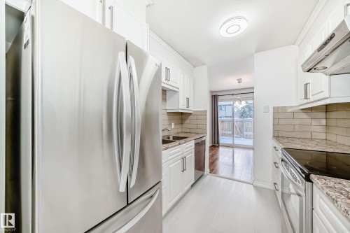 2 Grandin Village, St. Albert, AB - Indoor Photo Showing Kitchen With Double Sink With Upgraded Kitchen