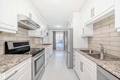 2 Grandin Village, St. Albert, AB - Indoor Photo Showing Kitchen With Double Sink With Upgraded Kitchen