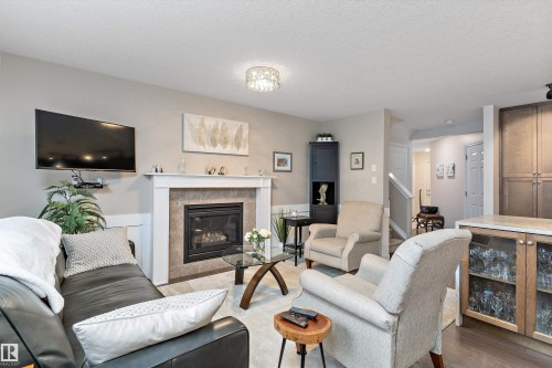 42 6835 Speaker Vista, Edmonton, AB - Indoor Photo Showing Living Room With Fireplace