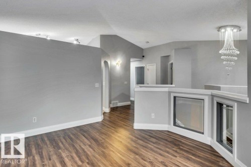 2812 40A Avenue, Edmonton, AB - Indoor Photo Showing Other Room With Fireplace
