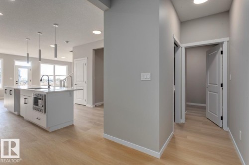 7113 51 Avenue, Beaumont, AB - Indoor Photo Showing Kitchen With Upgraded Kitchen