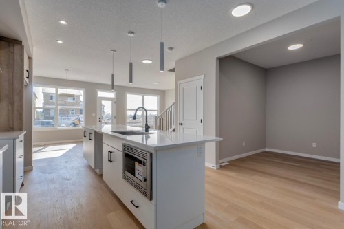 7113 51 Avenue, Beaumont, AB - Indoor Photo Showing Kitchen With Upgraded Kitchen
