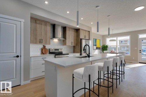 7113 51 Avenue, Beaumont, AB - Indoor Photo Showing Kitchen With Upgraded Kitchen