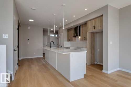 7113 51 Avenue, Beaumont, AB - Indoor Photo Showing Kitchen With Upgraded Kitchen