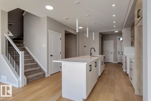 7113 51 Avenue, Beaumont, AB - Indoor Photo Showing Kitchen With Upgraded Kitchen